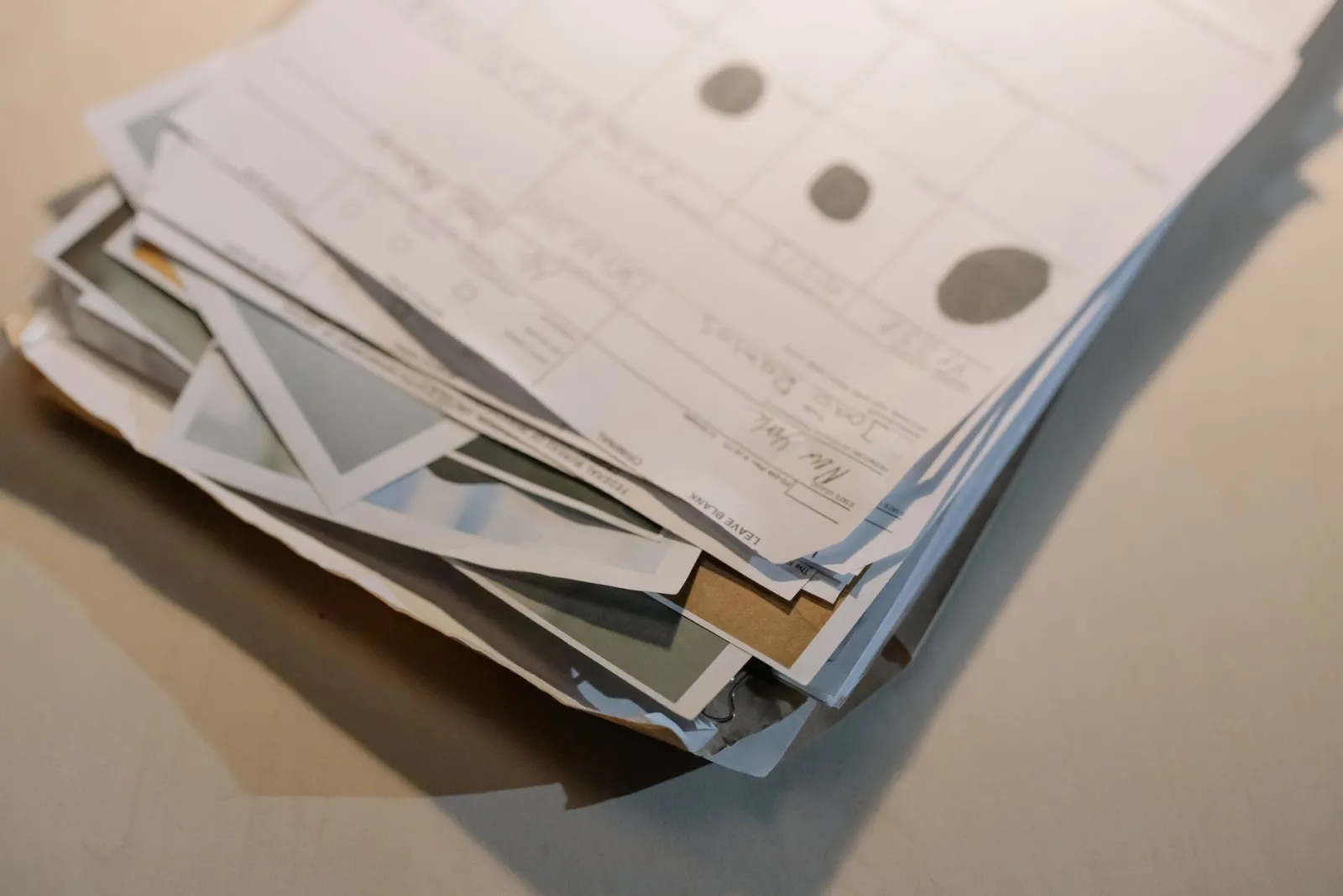 Overlapping stacks of the same paperwork filed twice
